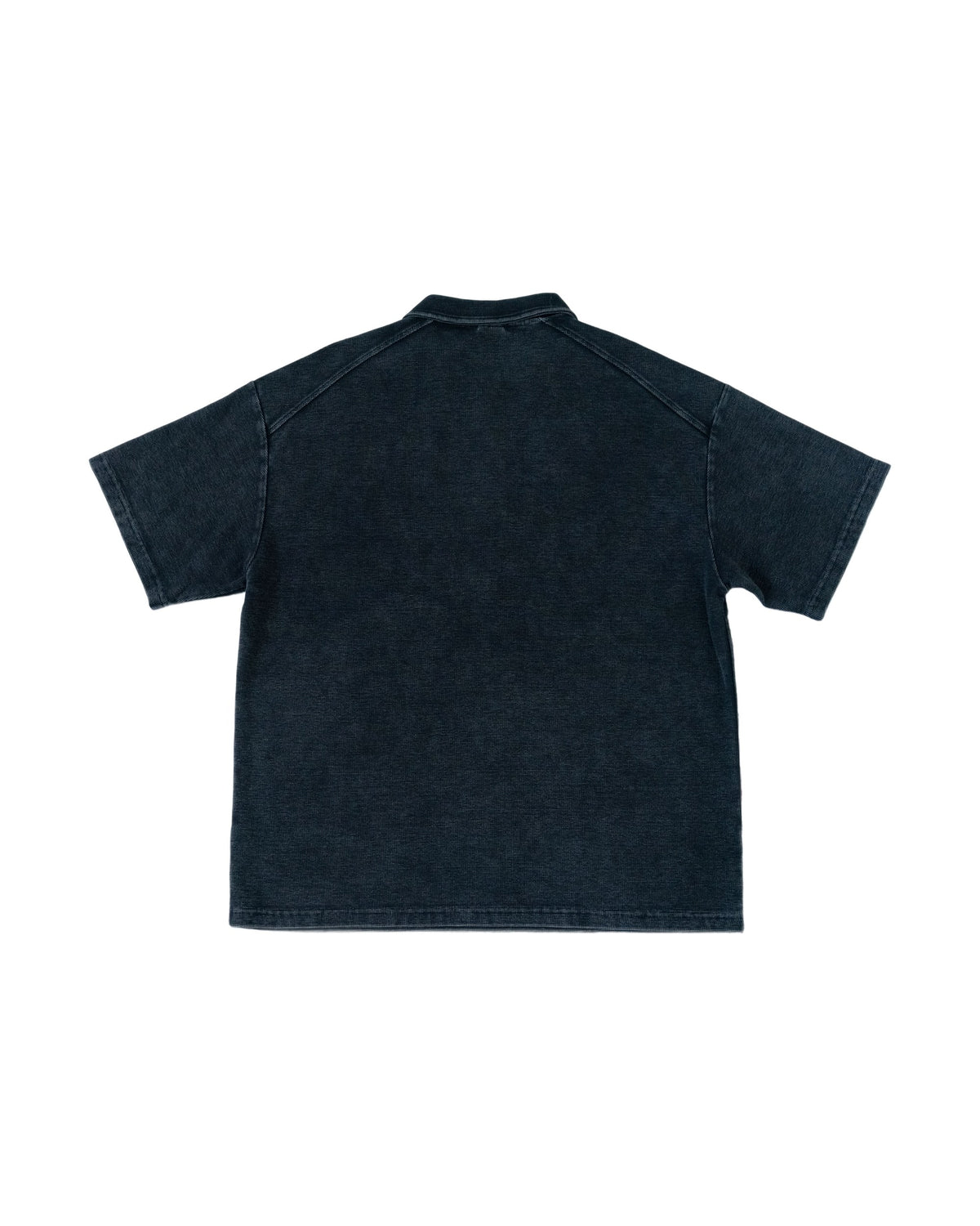 The Standard Zip Polo in Black, back