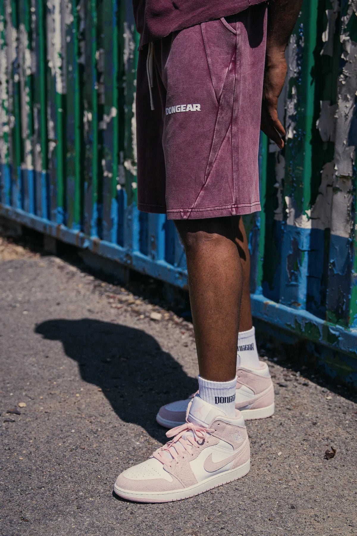 The Standard Shorts in Oxblood, worn
